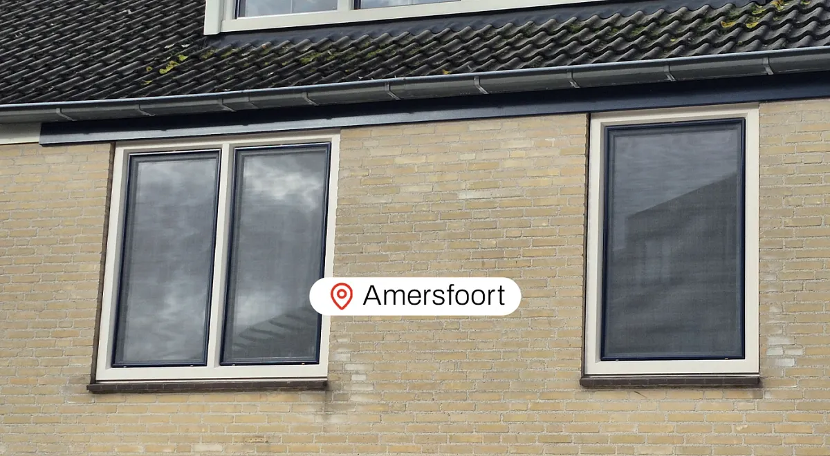 Bovengevel woning in Amersfoort met witte kunststof kozijnen