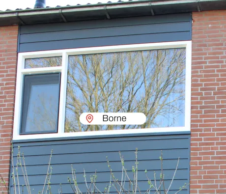 Bovengevel woning met kunststof kozijn en kunststof gevelbekleding